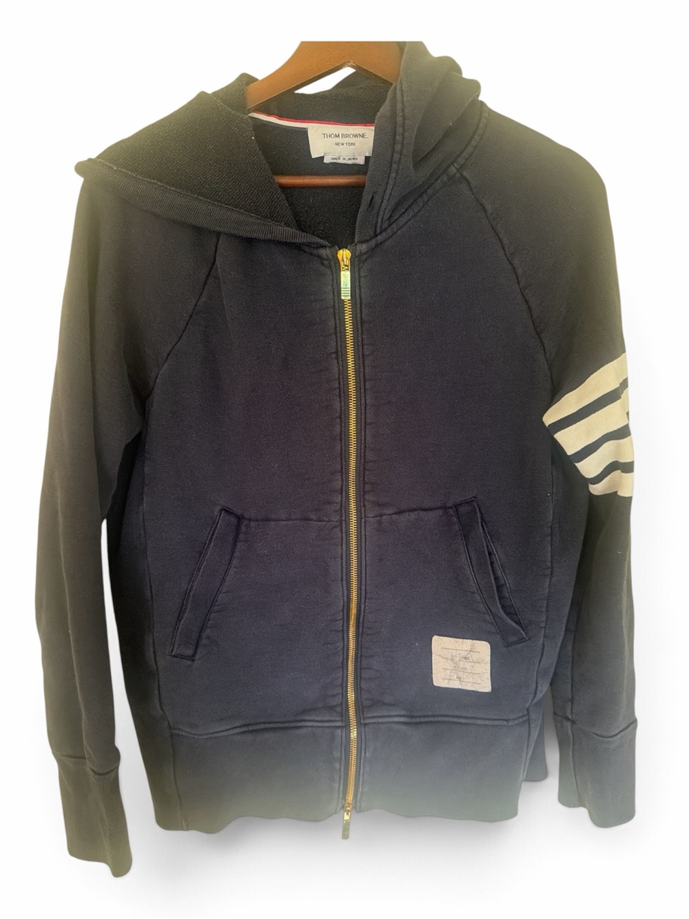 Thom Browne Navy Zip Hoodie with Gold Zipper and Cream Sleeve Stripes